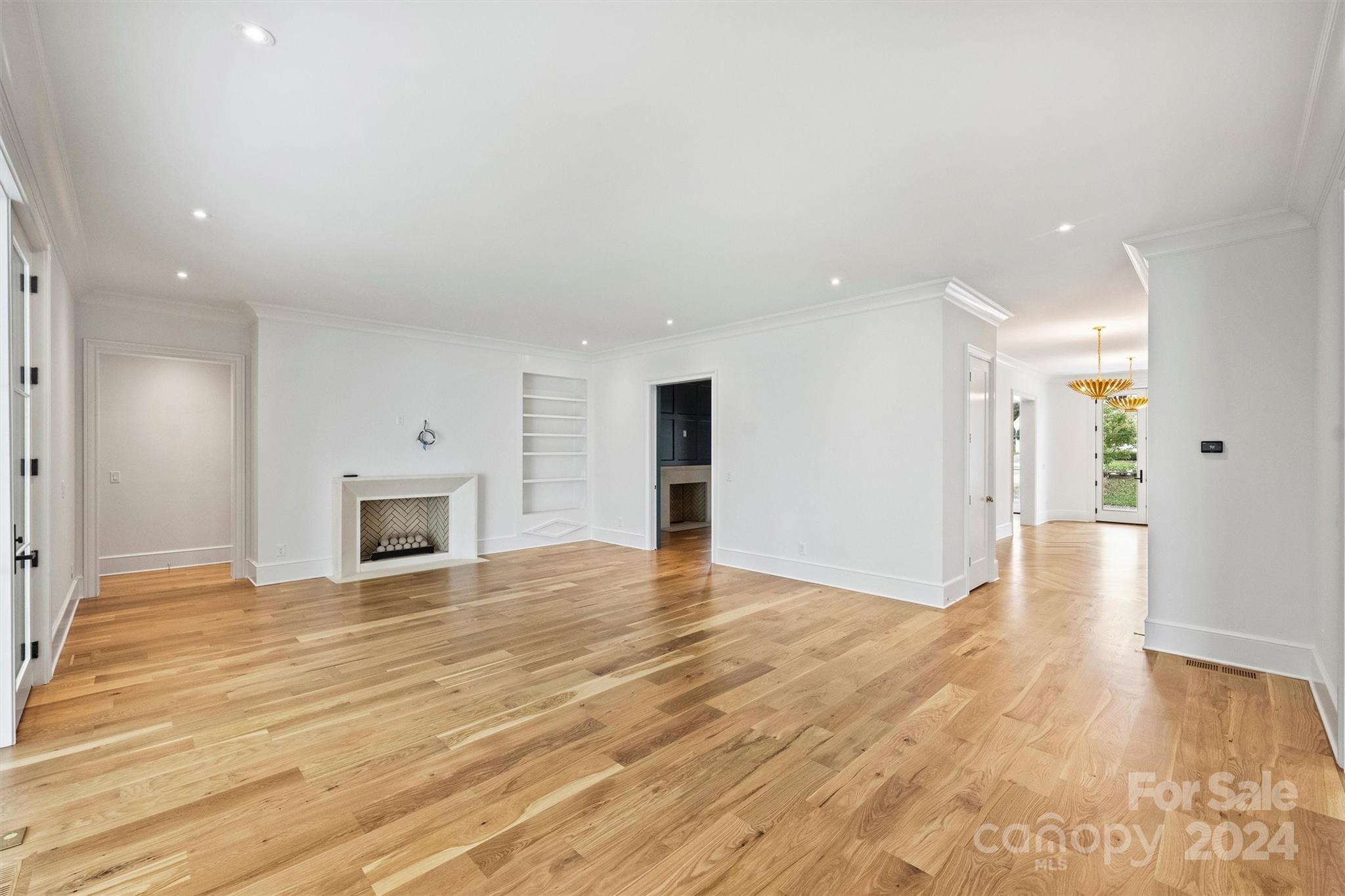 1601 Coventry Road Charlotte, NC 28211 - Photo 9 of 40 a view of a livingroom with wooden floor