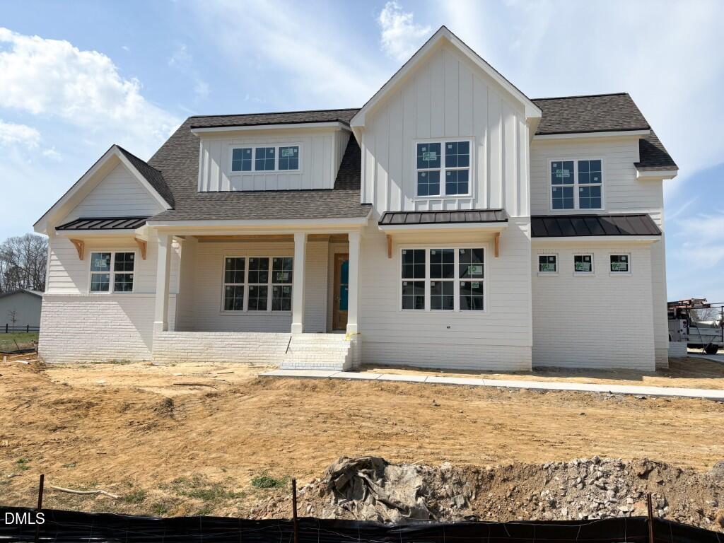 5864 Carriage Gate Drive Raleigh, NC 27603 - Photo 1 of 37 a view of a house with a swimming pool