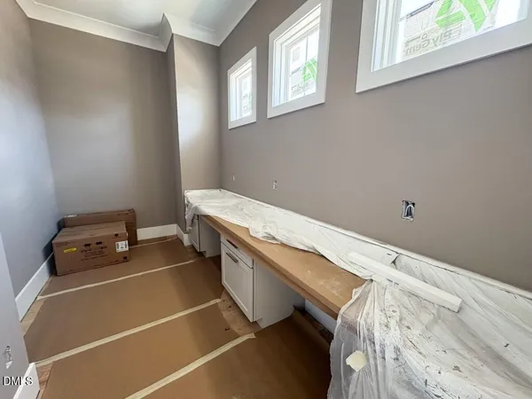 an empty room with windows