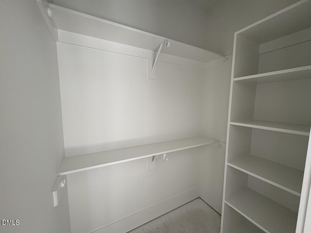 5864 Carriage Gate Drive Raleigh, NC 27603 - Photo 19 of 37 a view of an empty walk in closet