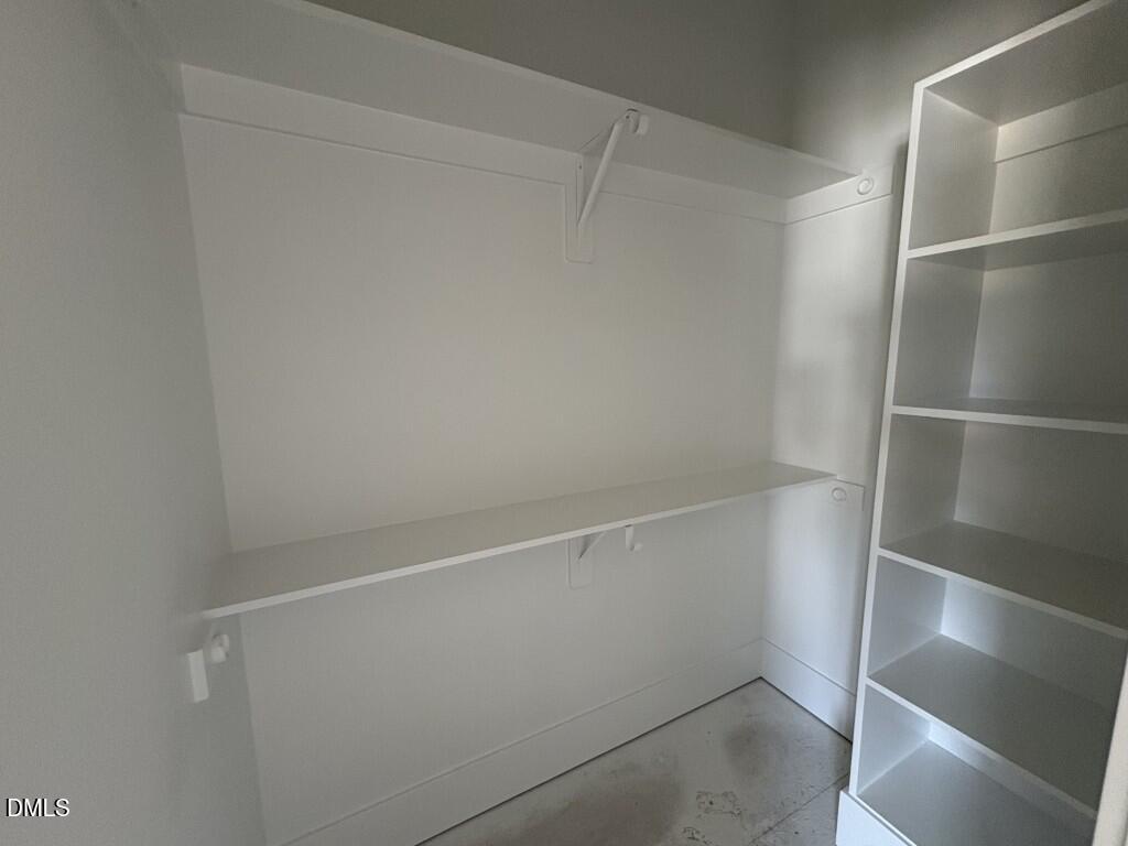 5864 Carriage Gate Drive Raleigh, NC 27603 - Photo 26 of 37 a view of an empty walk in closet