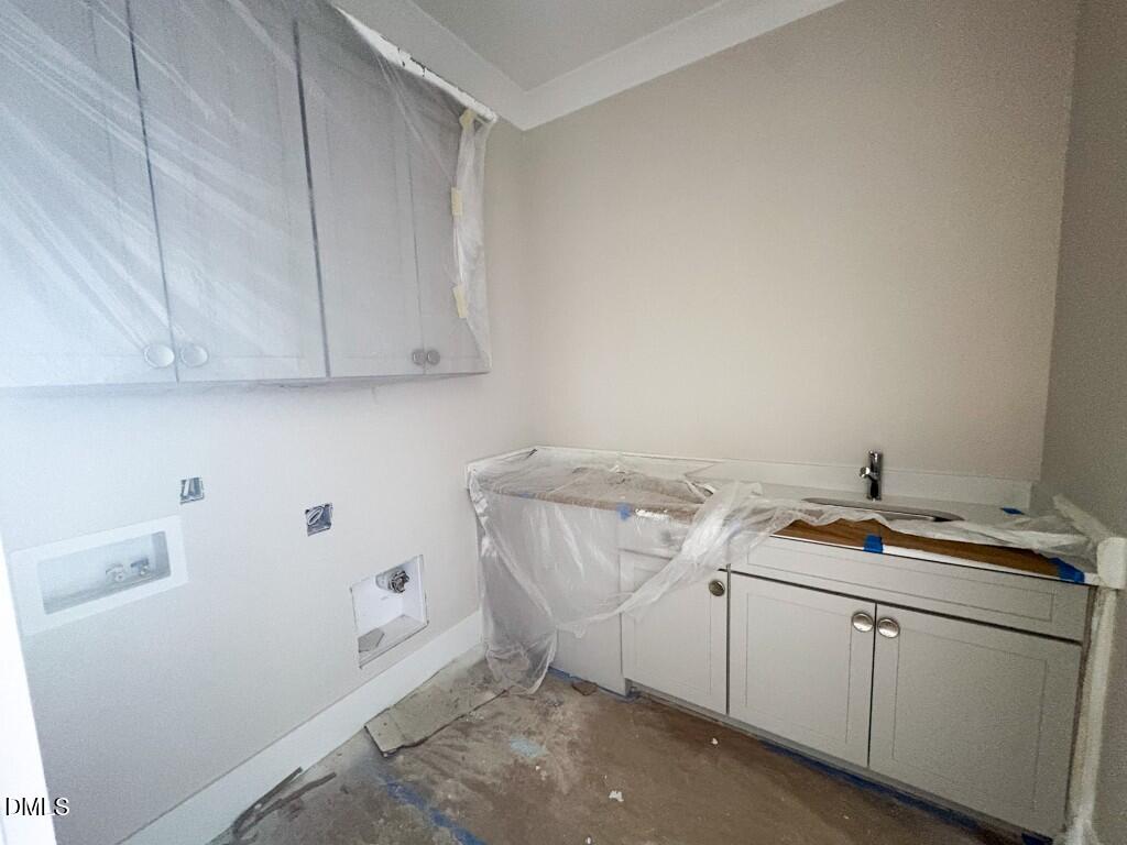 5864 Carriage Gate Drive Raleigh, NC 27603 - Photo 30 of 37 a room with storage and utility