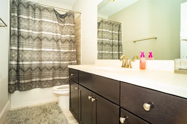 a bathroom with a sink and a bathtub