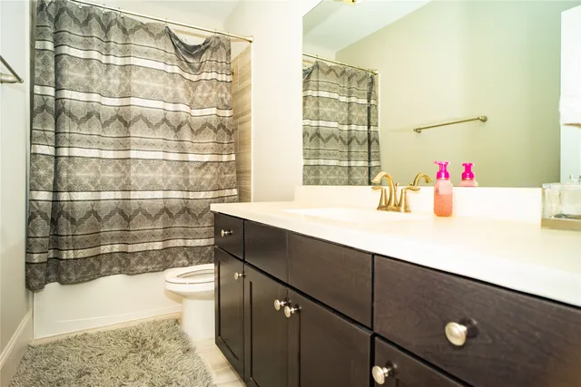 a bathroom with a sink and a bathtub