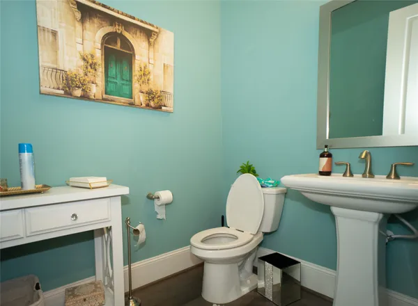 a bathroom with a sink and a toilet