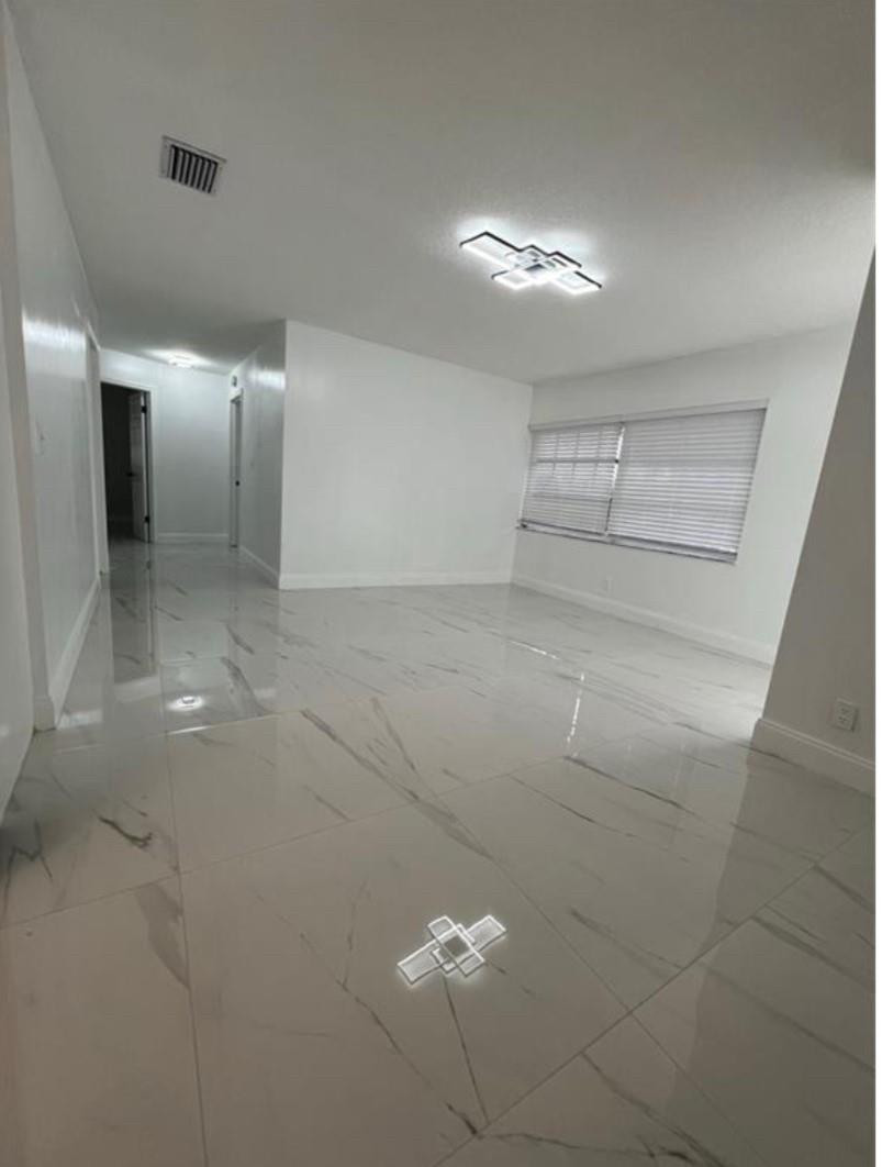 22062 Acapulco Court Boca Raton, FL 33428 - Photo 4 of 9 a view of a room with an empty space