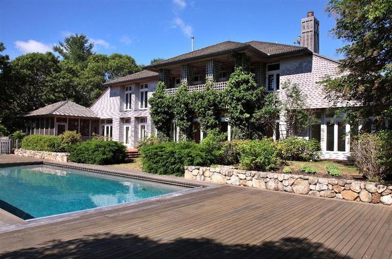 5 Mute Swan Circle Mashpee, MA 02649 - Photo 2 of 34 a front view of a house with a yard