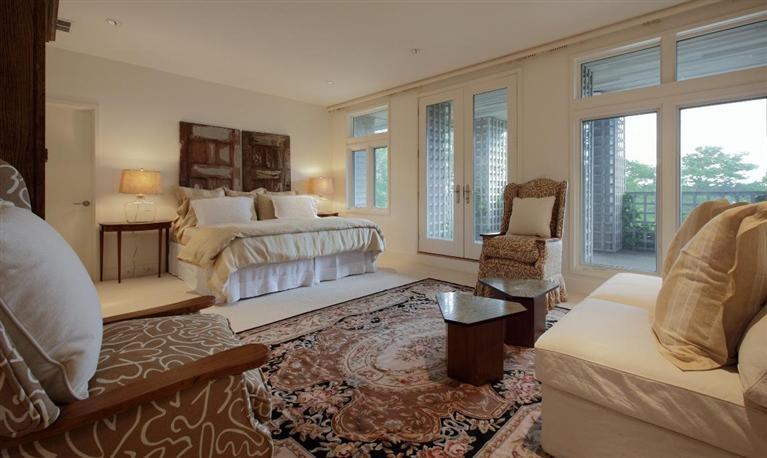 5 Mute Swan Circle Mashpee, MA 02649 - Photo 22 of 34 a living room with furniture a lamp and a large window
