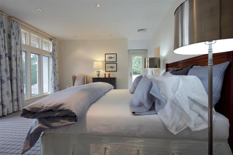 5 Mute Swan Circle Mashpee, MA 02649 - Photo 24 of 34 a bedroom with a bed and window