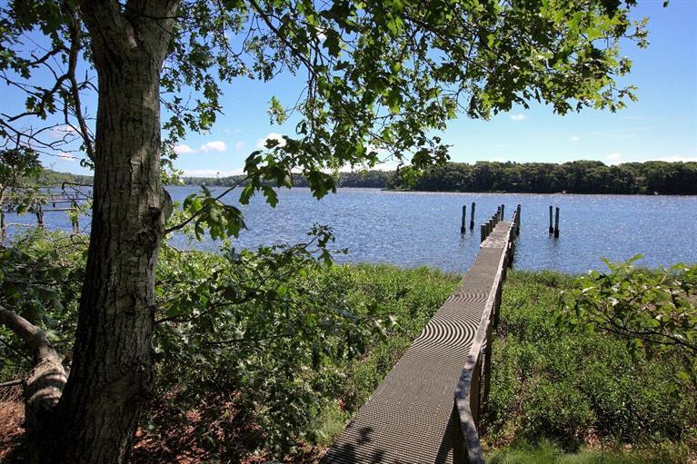 5 Mute Swan Circle Mashpee, MA 02649 - Photo 29 of 34 an aerial view of a house with a garden