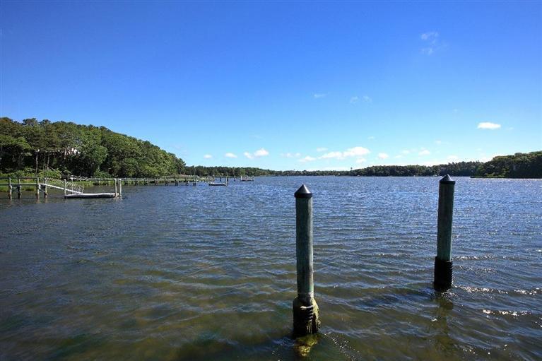5 Mute Swan Circle Mashpee, MA 02649 - Photo 31 of 34 a view of a wooden floor and lake view