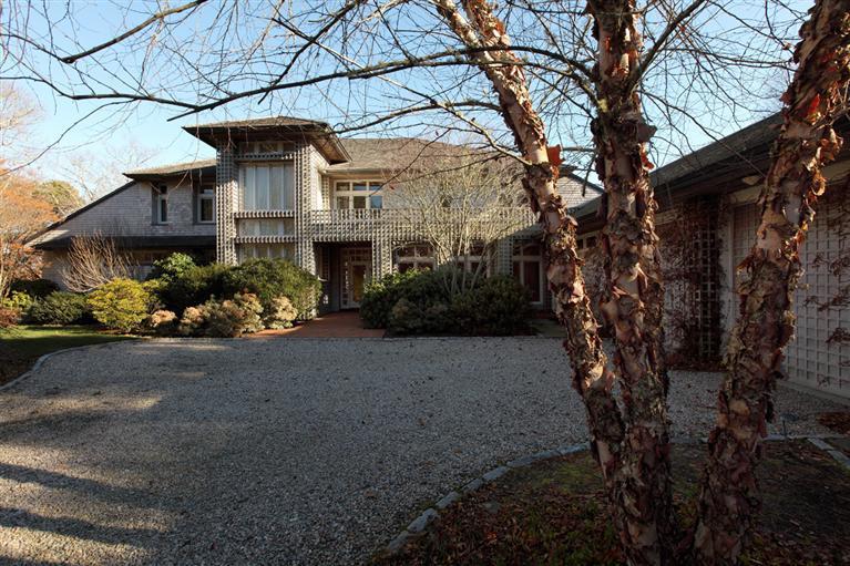 5 Mute Swan Circle Mashpee, MA 02649 - Photo 34 of 34 a front view of a house with a yard and garden