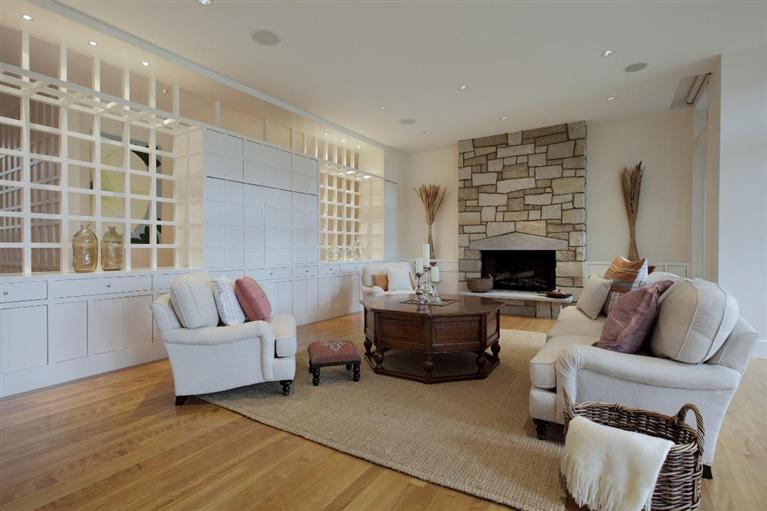 5 Mute Swan Circle Mashpee, MA 02649 - Photo 6 of 34 a living room with furniture and a fireplace