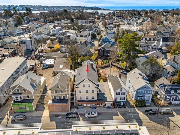 an aerial view of a building with outdoor space