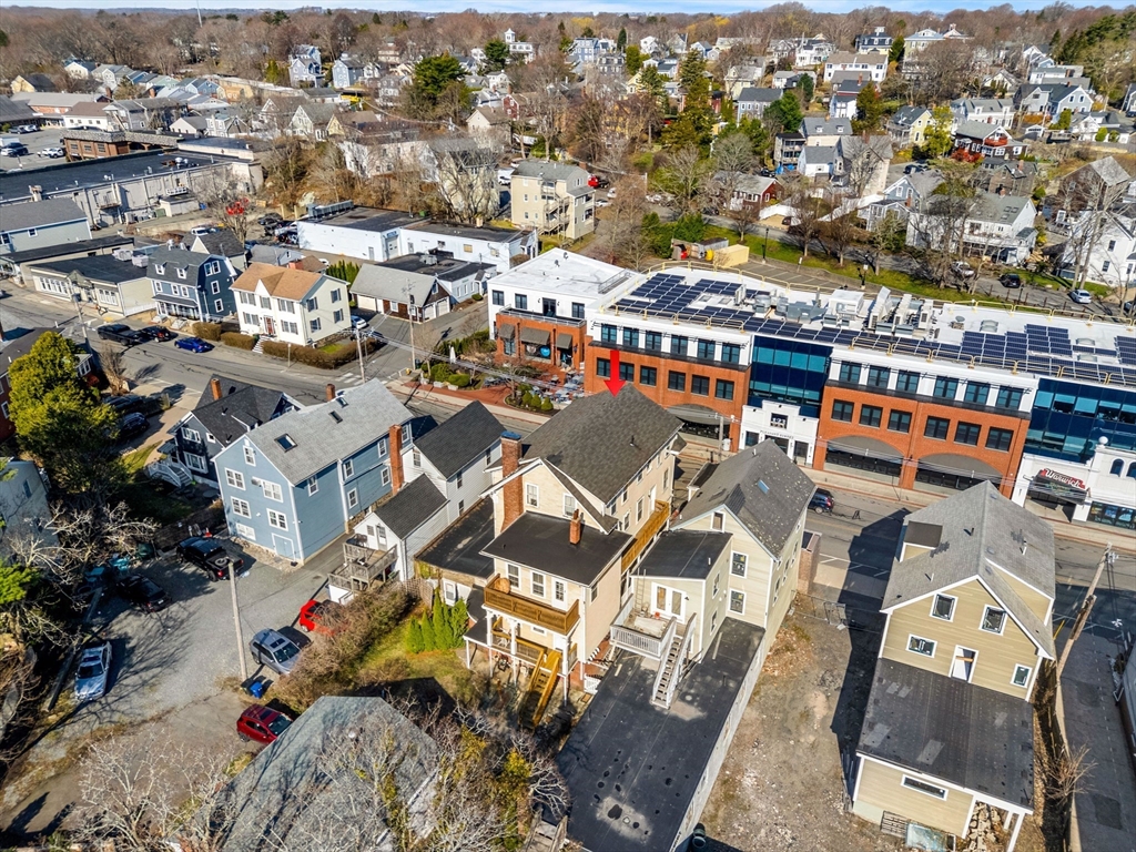126 Pleasant Street Marblehead, MA 01945 - Photo 18 of 20 an aerial view of a building with outdoor space