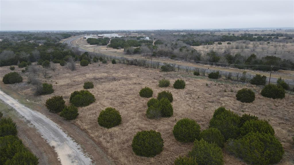 36010 Cedar View Court Whitney, TX 76692 - Photo 4 of 5 a view of a backyard of a house with lots of green space