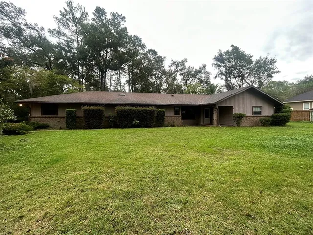a front view of house with a yard