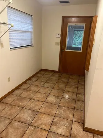 a view of a room with racks on the wall