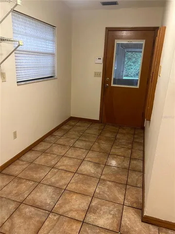 a view of a room with racks on the wall