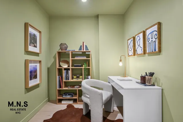 a kitchen with stainless steel appliances a sink and a refrigerator