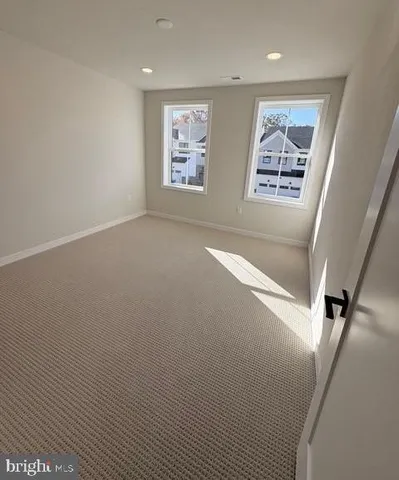 a view of outdoor space with garden and trees