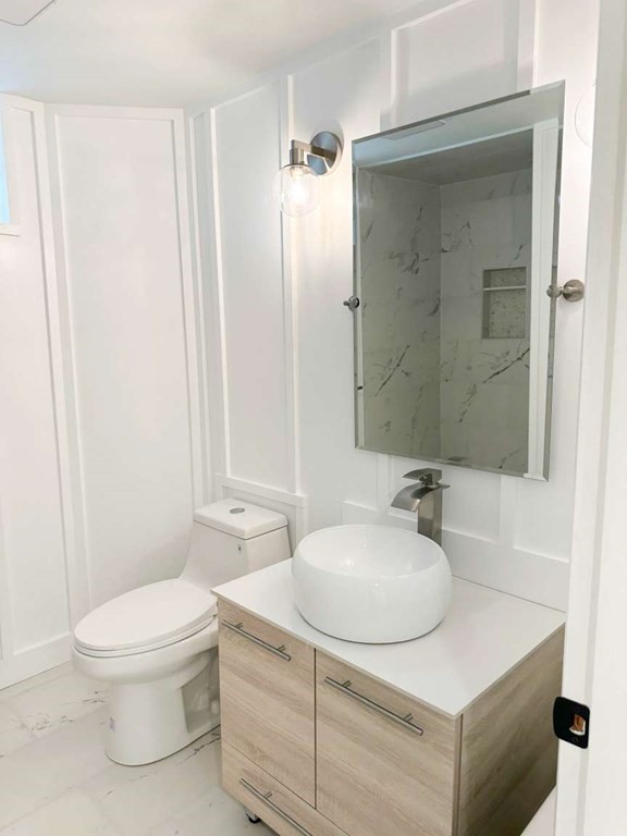 123 Burbank Road Sutton, MA 01590 - Photo 17 of 20 a bathroom with a sink toilet and shower