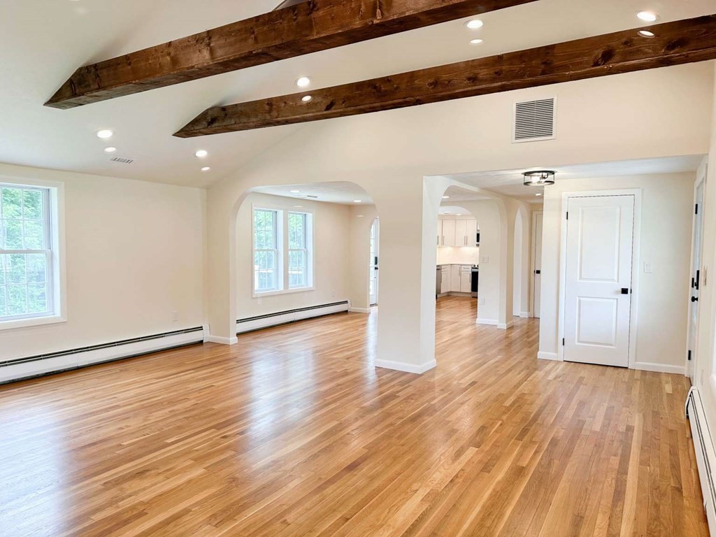 123 Burbank Road Sutton, MA 01590 - Photo 3 of 20 a view of a hallway with wooden floor