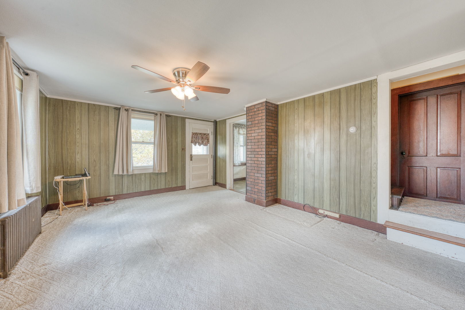 287 Maple Road Mansfield, CT 06268 - Photo 11 of 38 an empty room with windows and a chandelier fan