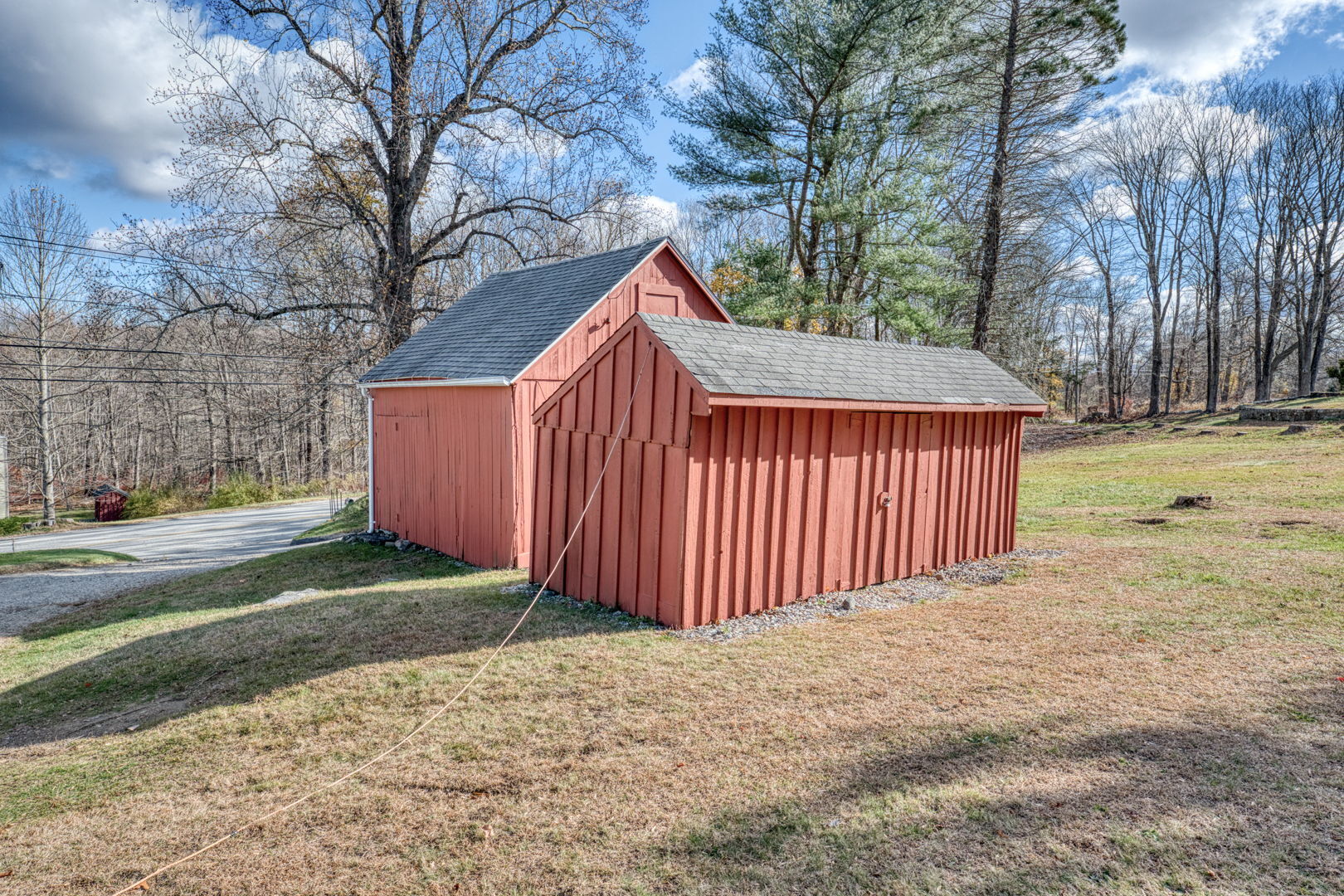 287 Maple Road Mansfield, CT 06268 - Photo 29 of 38 a view of a backyard with wooden fence