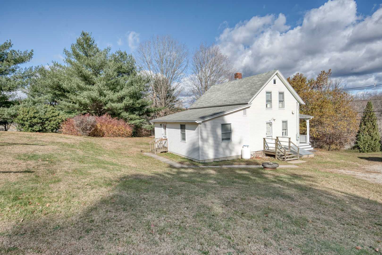 287 Maple Road Mansfield, CT 06268 - Photo 6 of 38 a view of a house with a yard