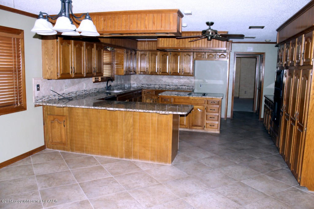 3525 Rutson Drive Amarillo, TX 79109 - Photo 23 of 72 Breakfast Room into Kitchen