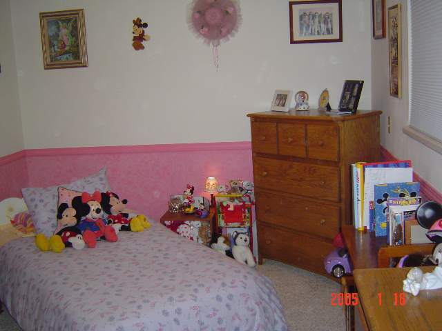 2505 Bryan Street Reno, NV 89503 - Photo 3 of 6 a bed room with a bed and a baby crib