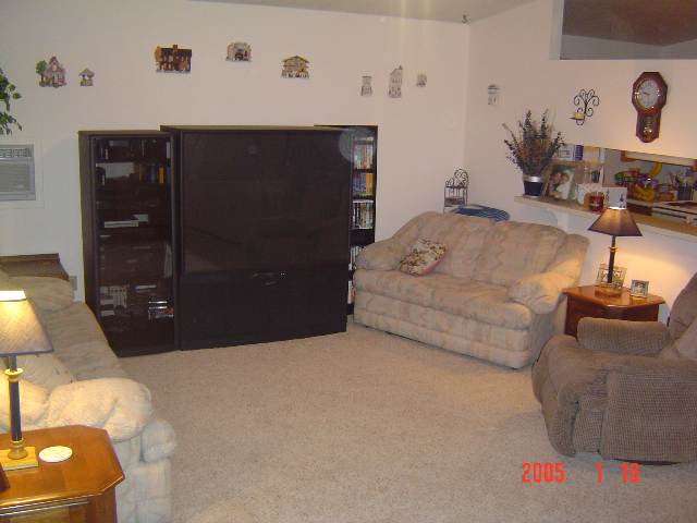 2505 Bryan Street Reno, NV 89503 - Photo 4 of 6 a living room with furniture and a lamp