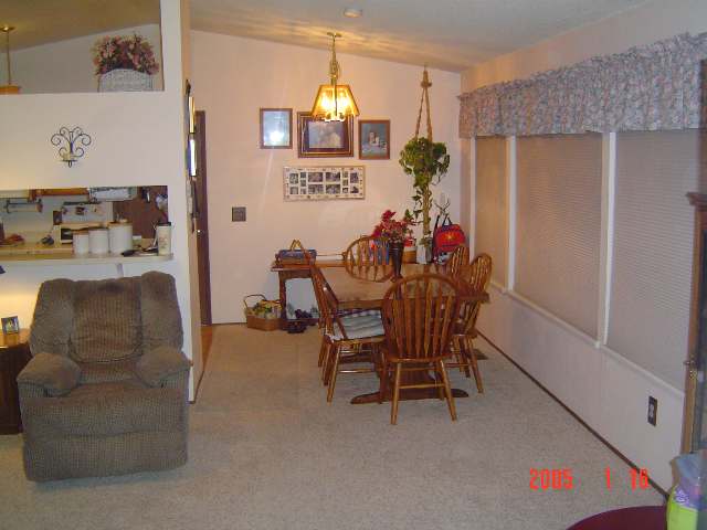 2505 Bryan Street Reno, NV 89503 - Photo 5 of 6 a living room with furniture and a chandelier