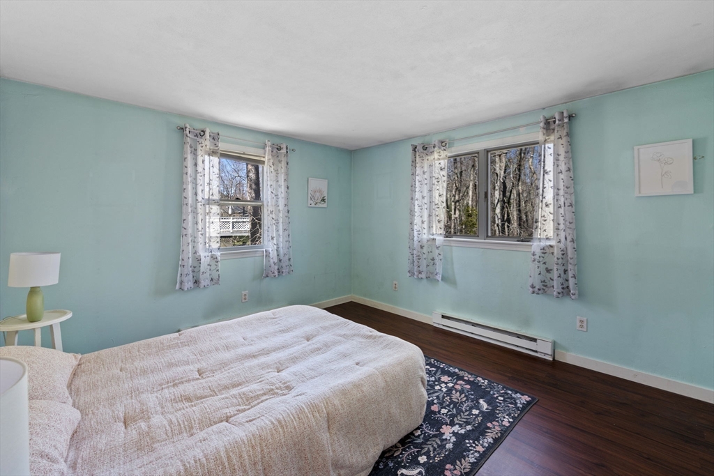6 True Road Salisbury, MA 01952 - Photo 14 of 40 a bedroom with a bed and a window