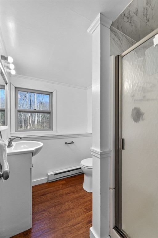 6 True Road Salisbury, MA 01952 - Photo 26 of 40 a bathroom with a sink a toilet and shower