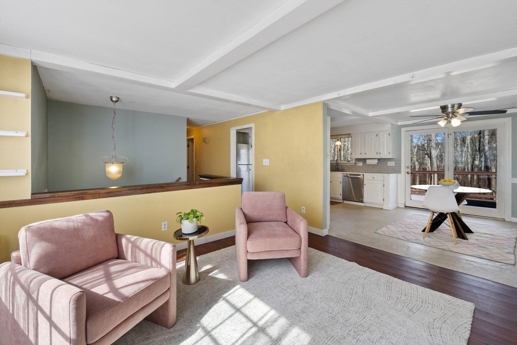 6 True Road Salisbury, MA 01952 - Photo 4 of 40 a living room with furniture and wooden floor