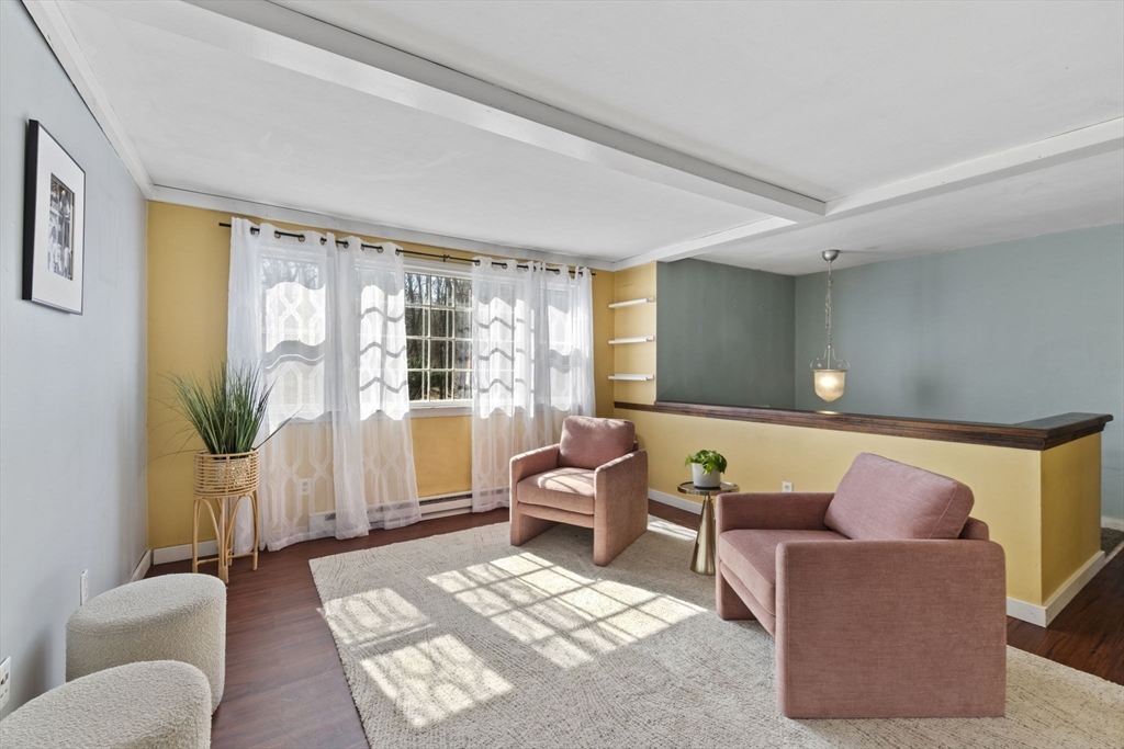 6 True Road Salisbury, MA 01952 - Photo 5 of 40 a living room with furniture and a potted plant