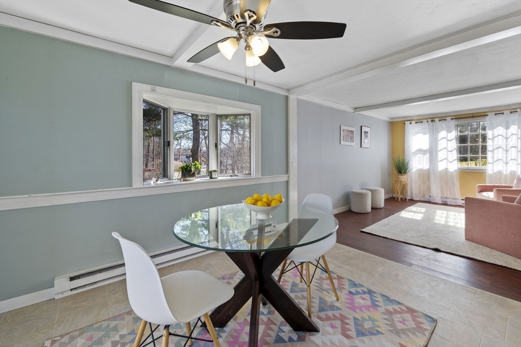 6 True Road Salisbury, MA 01952 - Photo 6 of 40 a view of a dining room with furniture window and outside view