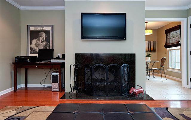1003 General George Patton Road, Unit 1003 Nashville, TN 37221 - Photo 2 of 16 Woodburning fireplace with new firebox, granite hearth and surround