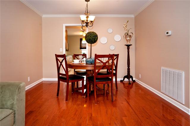 1003 General George Patton Road, Unit 1003 Nashville, TN 37221 - Photo 6 of 16 Rich wood floors here along with new lighting!