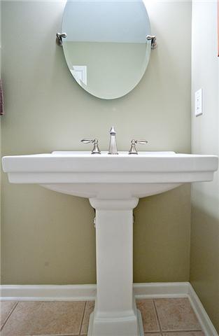1003 General George Patton Road, Unit 1003 Nashville, TN 37221 - Photo 8 of 16 Generous size powder room on main level.