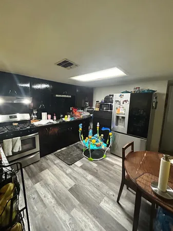 a bedroom with bed and window