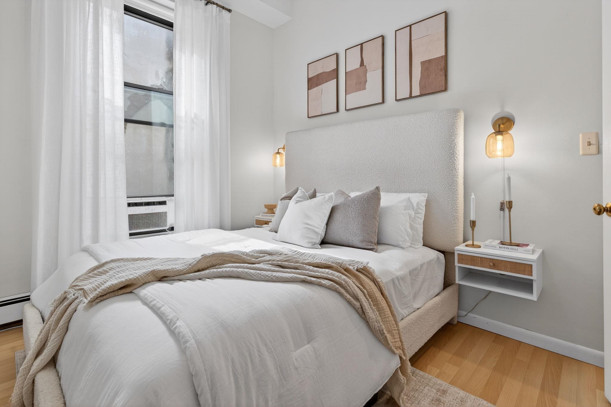 723 Washington Street, Unit 5 Hoboken, NJ 07030 - Photo 11 of 25 a bedroom with a bed and a window