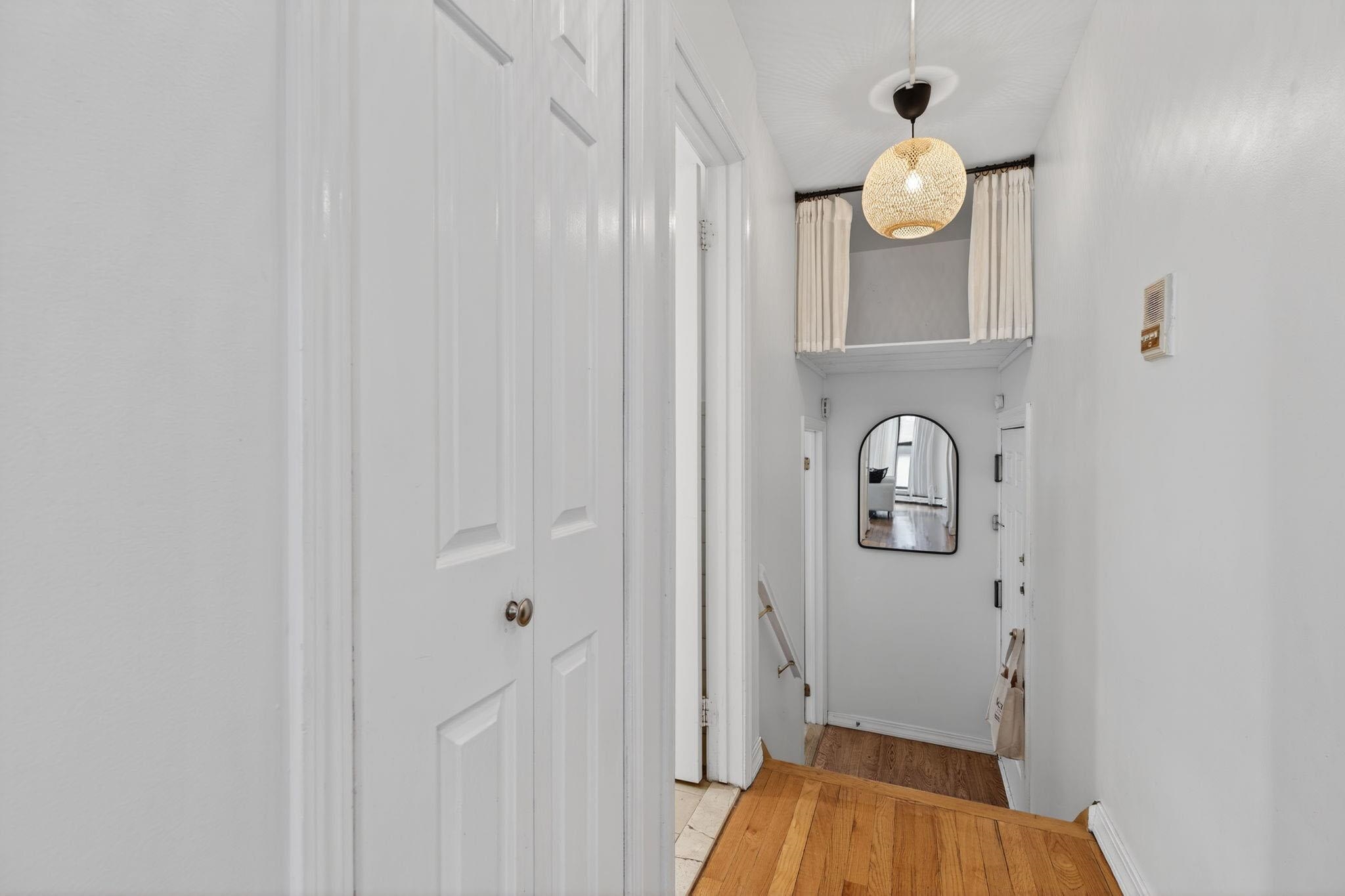 723 Washington Street, Unit 5 Hoboken, NJ 07030 - Photo 17 of 25 wooden floor in a en suite bathroom