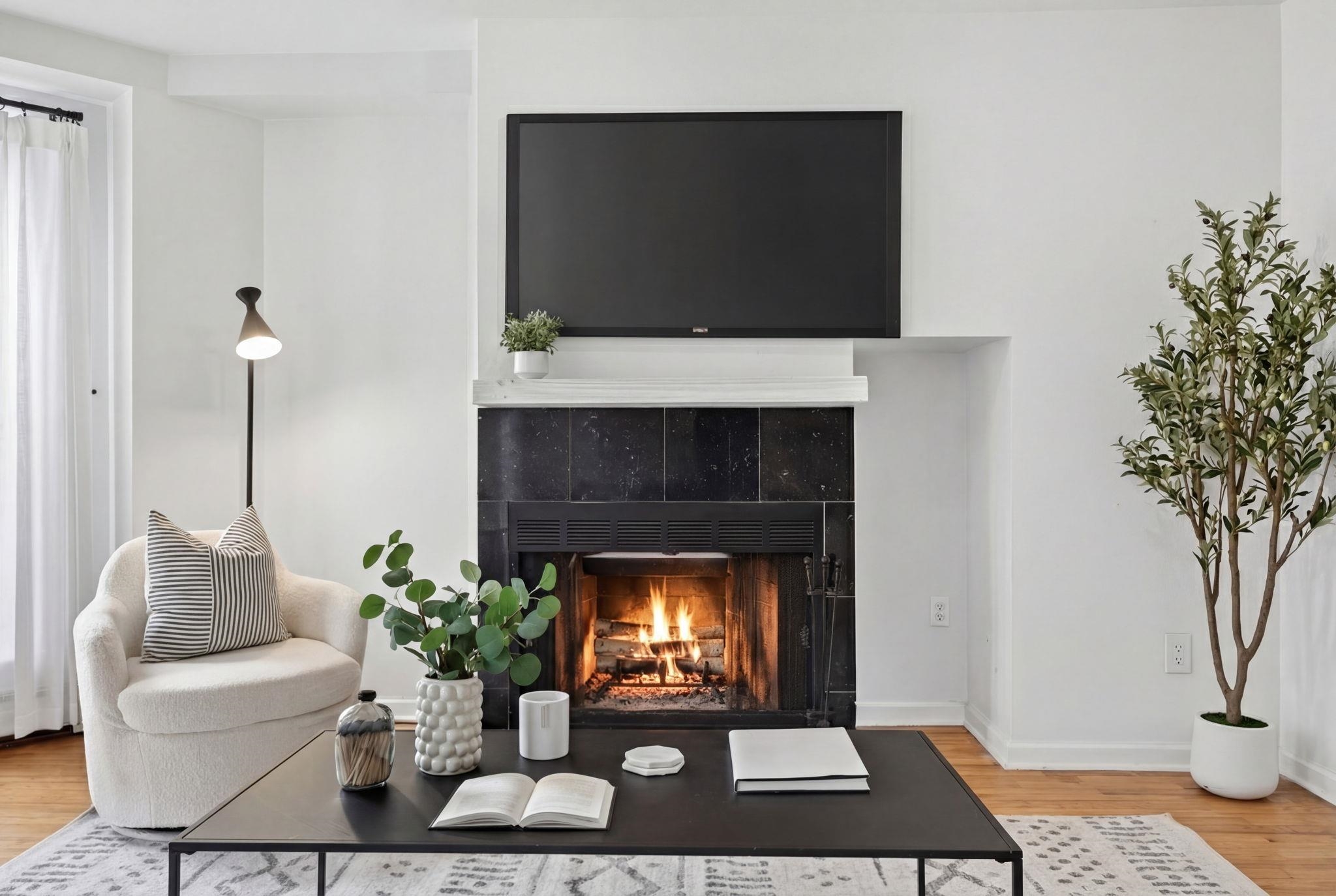 723 Washington Street, Unit 5 Hoboken, NJ 07030 - Photo 2 of 25 a living room with furniture and a fireplace