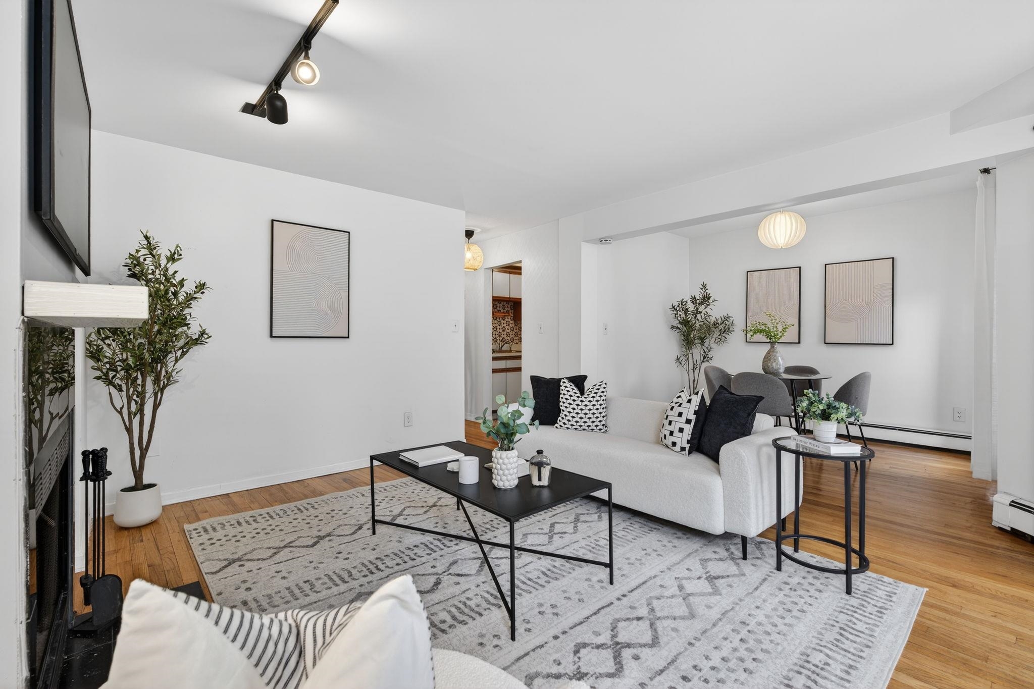 723 Washington Street, Unit 5 Hoboken, NJ 07030 - Photo 4 of 25 a living room with furniture and wooden floor
