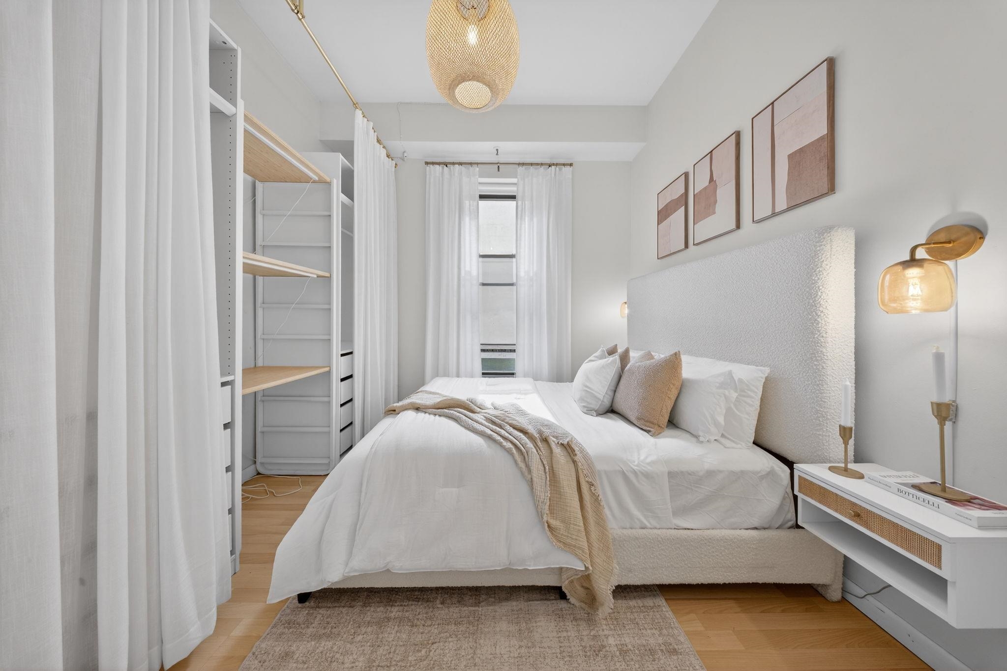 723 Washington Street, Unit 5 Hoboken, NJ 07030 - Photo 10 of 25 a bedroom with a bed and a cabinets