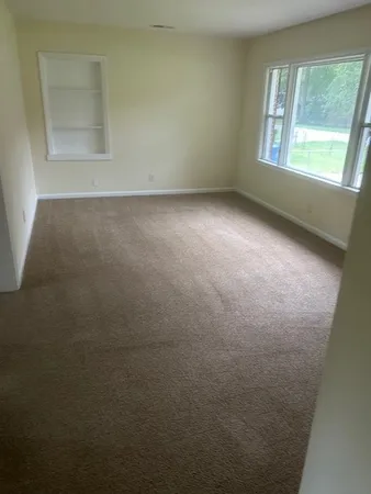 an empty room with a window