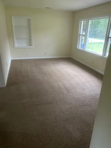 an empty room with a window